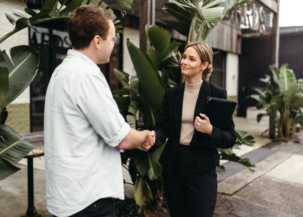 A dedicated property manager talking with an owner