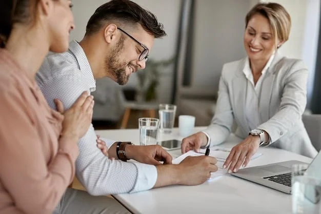 People discussing documents around a table