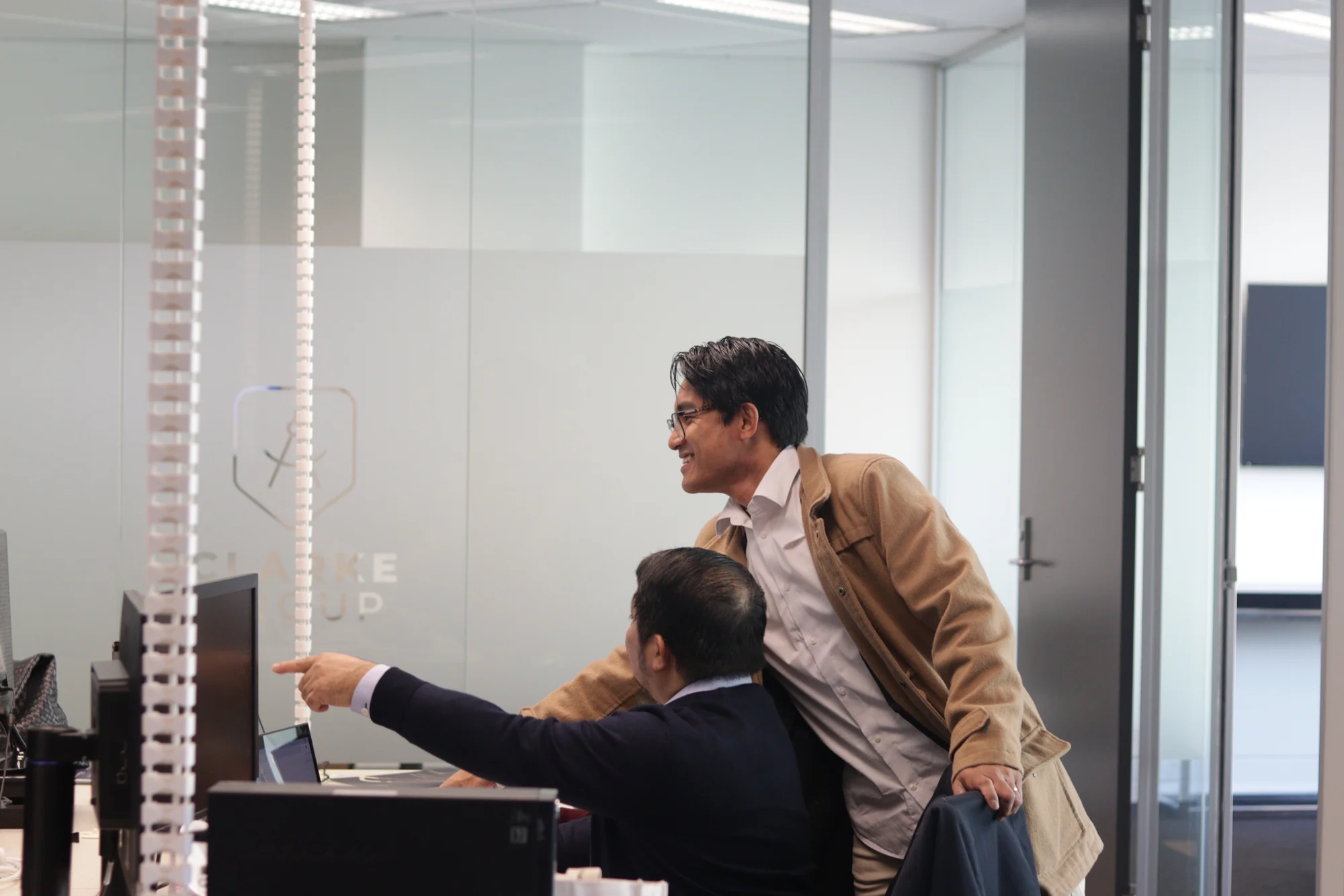 The Clarke Group team working together in Auckland
